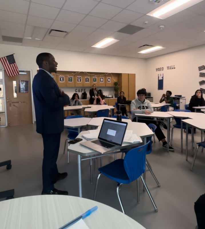Threads for Change speaker addressing students in a classroom