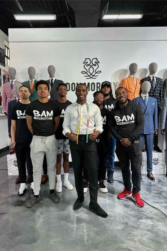 A gallery capturing the Becoming a Man (BAM) Youth Guidance attendees participating in the Dress for Success initiative. — photo 1