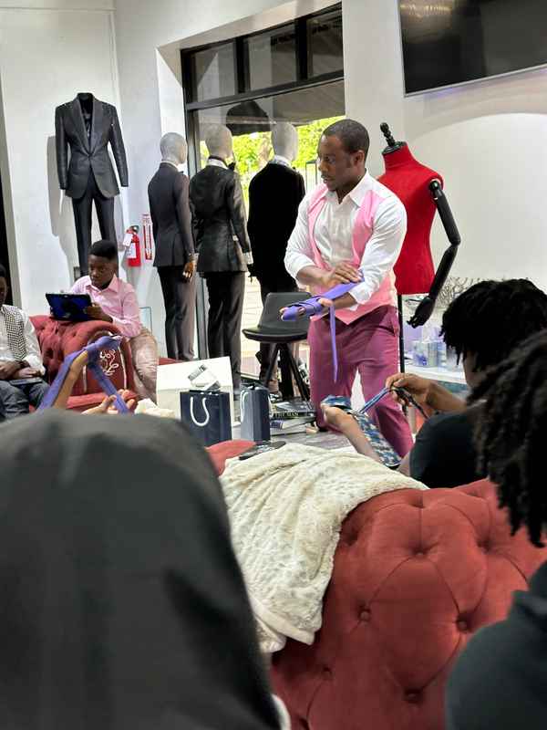 A gallery highlighting the Becoming a Man (BAM) Youth Guidance participants in the Dress for Success initiative, building confidence and career readiness. — photo 2