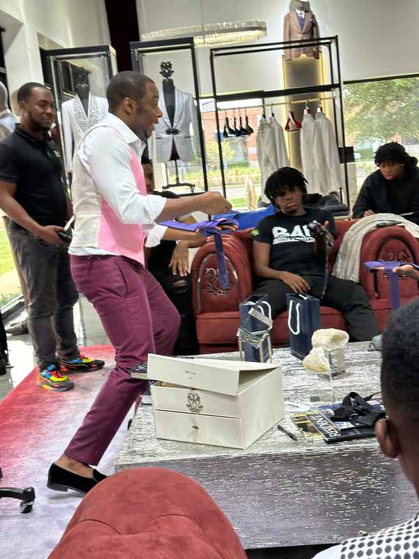 A gallery highlighting the Becoming a Man (BAM) Youth Guidance participants in the Dress for Success initiative, building confidence and career readiness. — photo 3