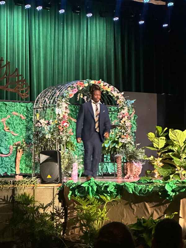 A gallery of students participating in the Dress for Success initiative, featuring their stylish journey on the runway at Skyline High School. &mdash; photo 2