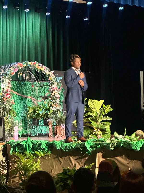 A gallery of students participating in the Dress for Success initiative, featuring their stylish journey on the runway at Skyline High School. &mdash; photo 4