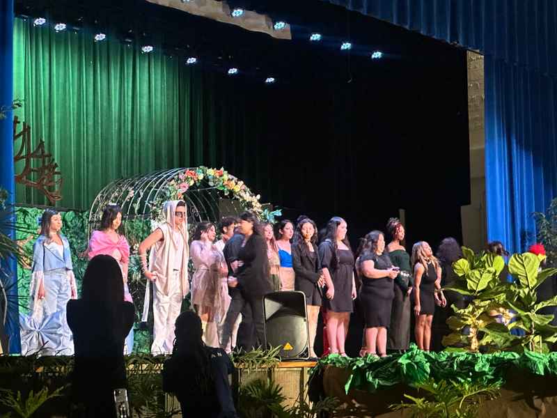 A gallery of students participating in the Dress for Success initiative, featuring their stylish journey on the runway at Skyline High School. &mdash; photo 6