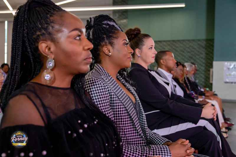 Audience members watching the Miss Forney Scholarship Pageant