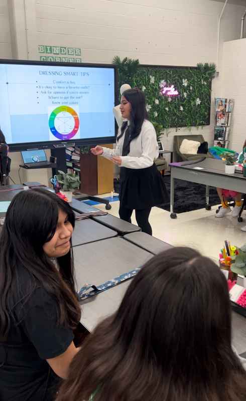 A gallery of students leading a fashion-focused event as part of the Dress for Success initiative at Skyline High School. — photo 3