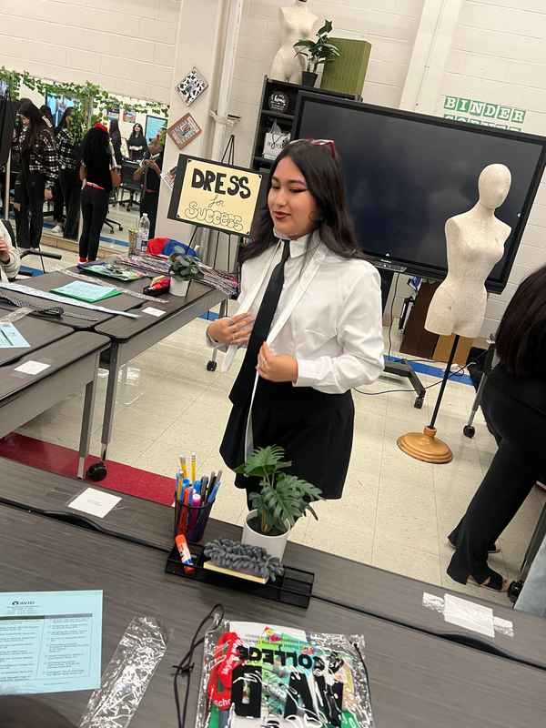 A gallery of students leading a fashion-focused event as part of the Dress for Success initiative at Skyline High School. — photo 4