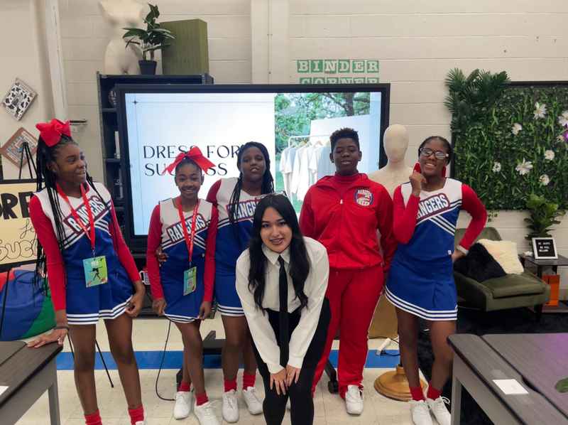 A gallery of students leading a fashion-focused event as part of the Dress for Success initiative at Skyline High School. — photo 5