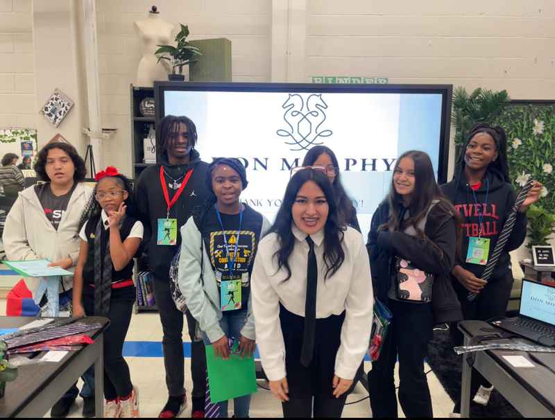 A gallery of students leading a fashion-focused event as part of the Dress for Success initiative at Skyline High School. — photo 6