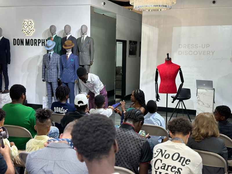 A gallery featuring participants engaging in the Dress for Success initiative, gaining professional attire and career preparation skills at the first monthly Dress-Up Discovery workshop. — photo 5