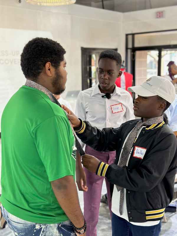 A gallery featuring participants engaging in the Dress for Success initiative, gaining professional attire and career preparation skills at the second monthly Dress-Up Discovery workshop. — photo 4
