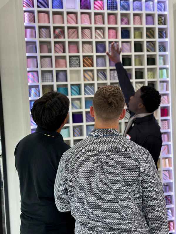 A gallery featuring participants engaging in the Dress for Success initiative, gaining professional attire and career preparation skills at the second monthly Dress-Up Discovery workshop. — photo 5