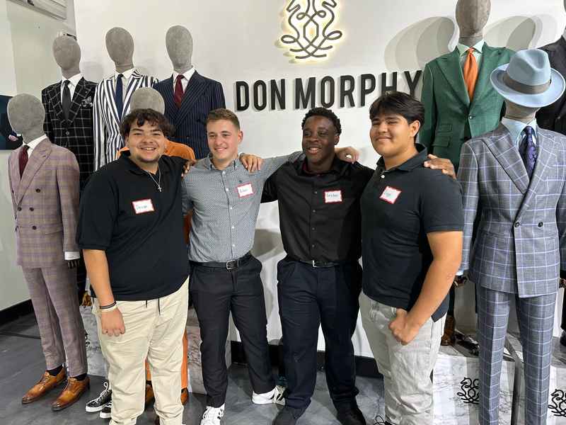 A gallery featuring participants engaging in the Dress for Success initiative, gaining professional attire and career preparation skills at the second monthly Dress-Up Discovery workshop. — photo 8