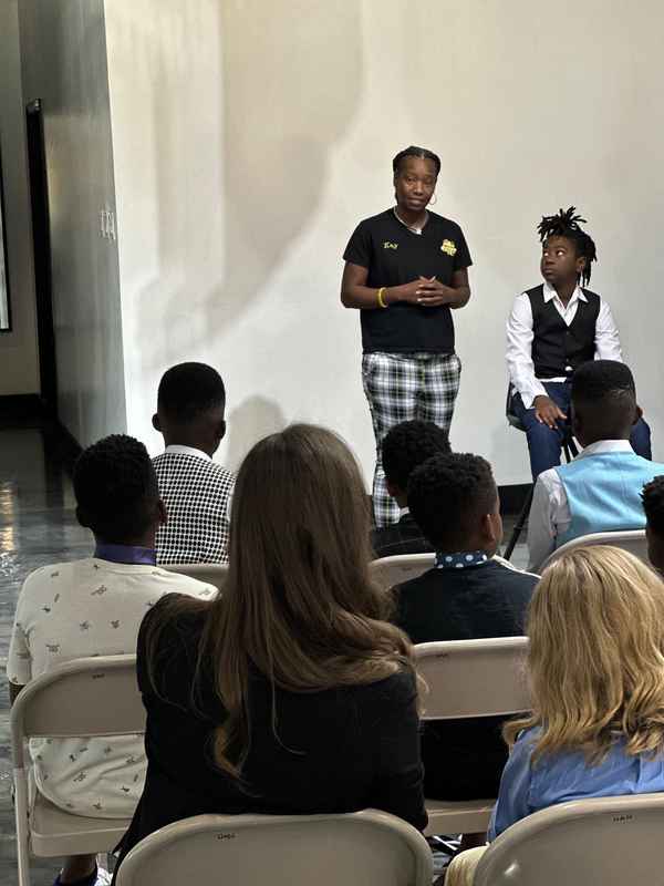 A gallery featuring participants engaging in the Dress for Success initiative, gaining professional attire and career preparation skills at the third monthly Dress-Up Discovery workshop. — photo 1