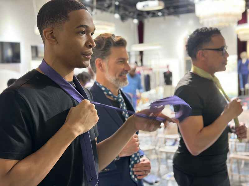 A gallery featuring participants engaging in the Dress for Success initiative, gaining professional attire and career preparation skills at the third monthly Dress-Up Discovery workshop. — photo 5