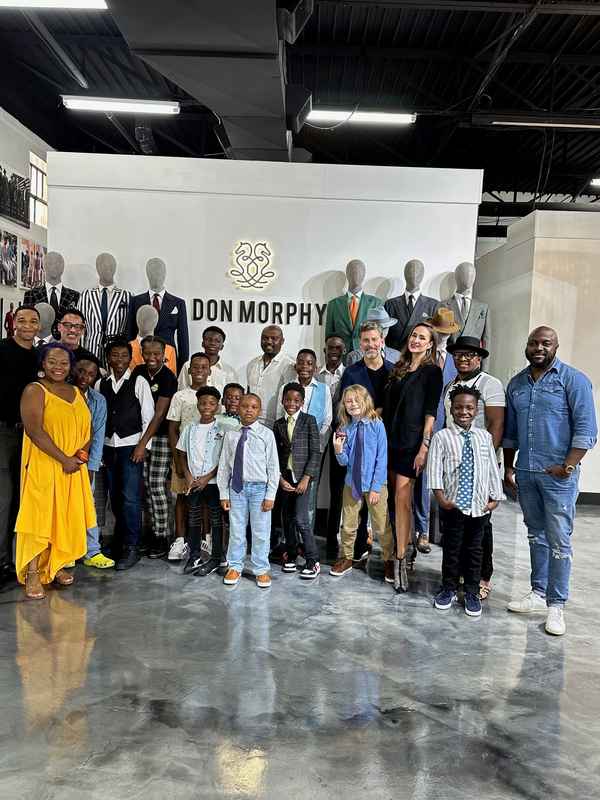 A gallery featuring participants engaging in the Dress for Success initiative, gaining professional attire and career preparation skills at the third monthly Dress-Up Discovery workshop. — photo 6